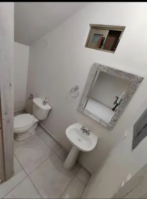 Un baño de Casa constitución