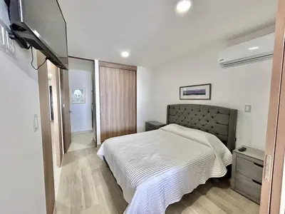 Cama o camas de una habitación en Modern apartment with sea view