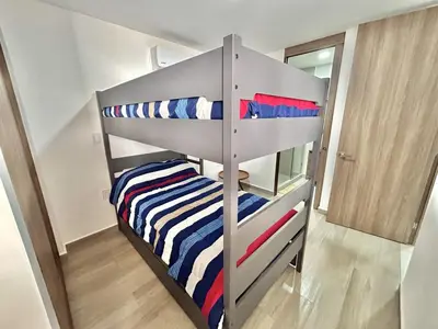 Cama o camas de una habitación en Modern apartment with sea view