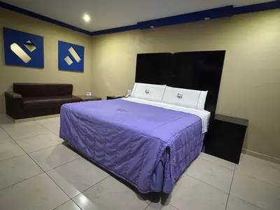 Cama o camas de una habitación en Motel El Peñon