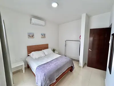 Cama o camas de una habitación en Depa near zona dorada and malecón by G P S rentas