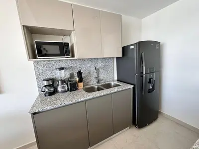 Una cocina o zona de cocina en Altomare Depa 1804