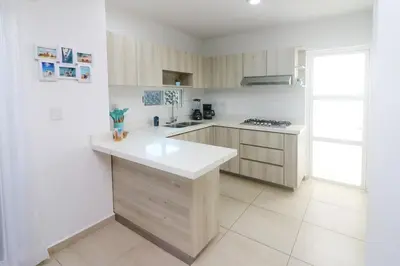 Plano de Oasis costero Acogedora Casa Familiar