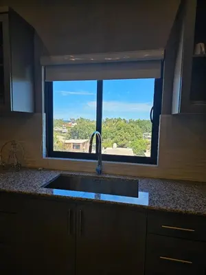 Una cocina o zona de cocina en Hermoso Penthouse