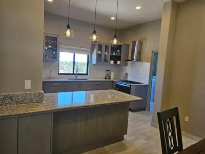 Una cocina o zona de cocina en Hermoso Penthouse