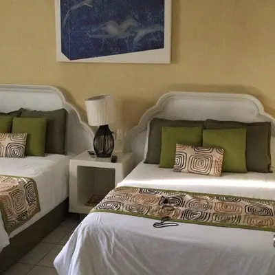 Cama o camas de una habitación en Cerritos Resort