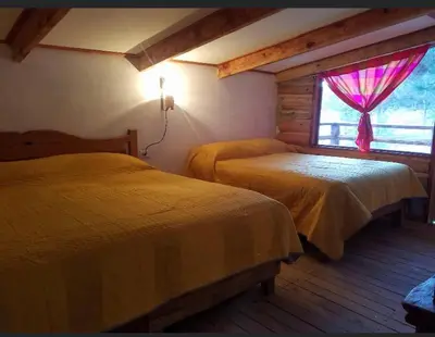 Cama o camas de una habitación en Cabañas los Álamos 2 Creel