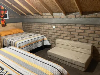 Cama o camas de una habitación en Cabañas los Álamos 2 Creel
