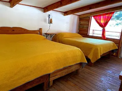 Cama o camas de una habitación en Cabañas los Álamos 2 Creel