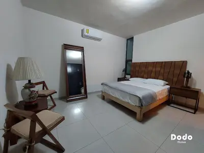 Cama o camas de una habitación en Departamentos en el centro de Mazatlán