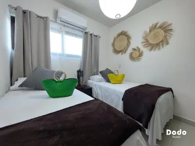 Cama o camas de una habitación en Departamentos en el centro de Mazatlán