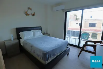 Cama o camas de una habitación en Departamentos a 3 minutos de Playa Olas Altas
