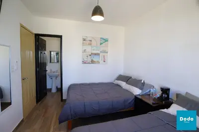 Cama o camas de una habitación en Residencial privado con alberca