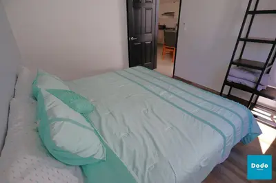 Cama o camas de una habitación en Residencial privado con alberca
