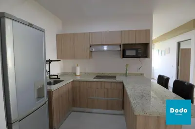 Una cocina o zona de cocina en Hermosos departamentos con laguna cristalina