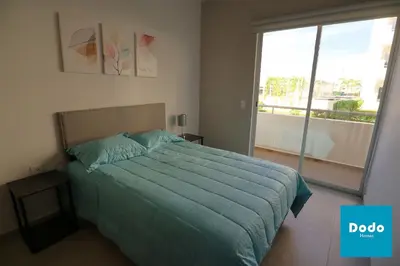 Cama o camas de una habitación en Hermosos departamentos con laguna cristalina