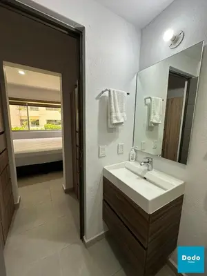 Un baño de Hermosos departamentos con laguna cristalina