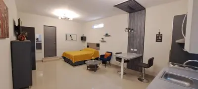 Una televisión o centro de entretenimiento en Tres Palmas Departamentos