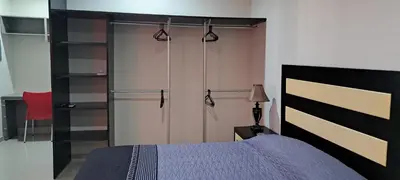 Cama o camas de una habitación en Tres Palmas Departamentos