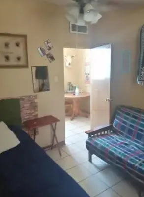 Una televisión o centro de entretenimiento en Casa Mboga
