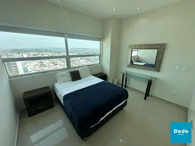 Cama o camas de una habitación en Departamento en Torre M