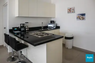 Una cocina o zona de cocina en Departamento en Torre M