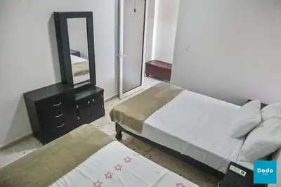 Cama o camas de una habitación en Departamento en Mazatlan a 5 minutos de la playa #333-28