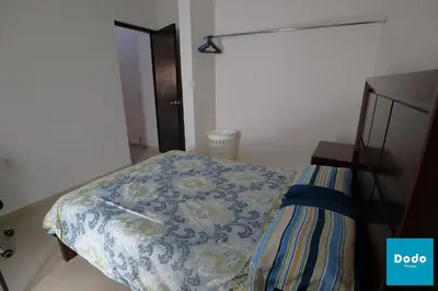 Cama o camas de una habitación en Departamentos a 3 minutos de la playa