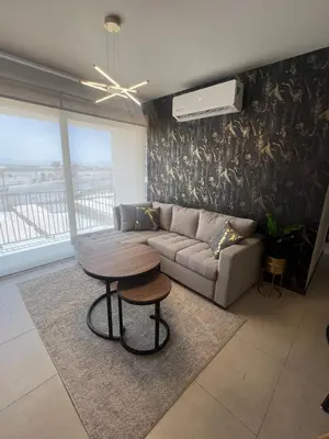 Zona de estar de Modern and equipped apartment