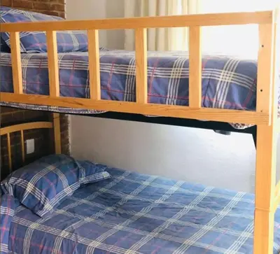 Cama o camas de una habitación en Casa González