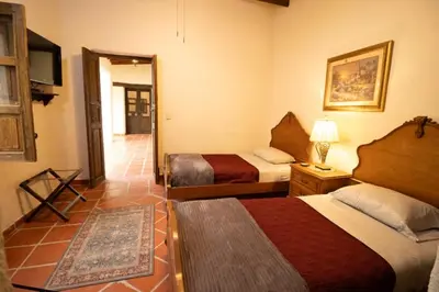 Cama o camas de una habitación en Casa Gloria
