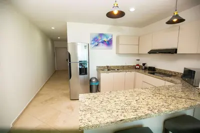 Una cocina o zona de cocina en Elegant Condo at Playa Brujas with Ocean View