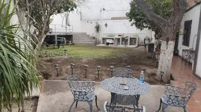 Jardín al aire libre en Casa con Alberca cerca del Aeropuerto