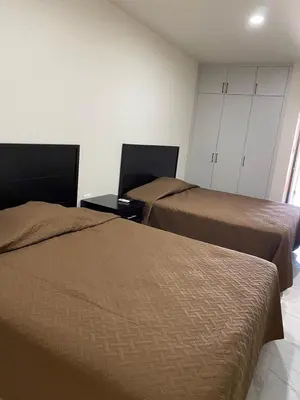 Cama o camas de una habitación en Suites 115