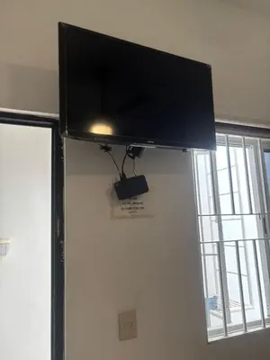 Una televisión o centro de entretenimiento en Posada don rulo