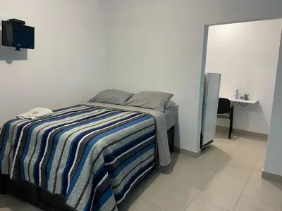 Cama o camas de una habitación en departamentos economicos en cu