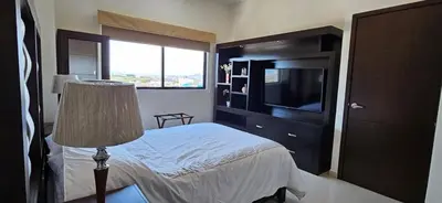 Cama o camas de una habitación en Departamento Torre Iberika Cercas Del Malecon