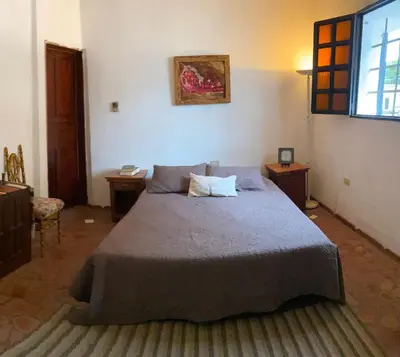 Cama o camas de una habitación en Recamara Colonial