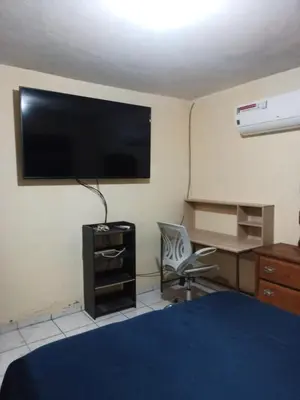 Una televisión o centro de entretenimiento en Casa Guaymas