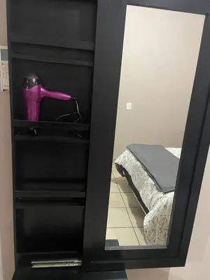 Cama o camas de una habitación en Cómodo ideal para ti cerca de estadio el encanto