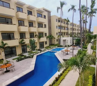 Piscina en o cerca de Nuevo departamento con acceso frente a la playa, jacuzzi y alberca climatizada
