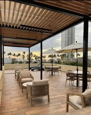 Un balcón o terraza de Nuevo departamento con acceso frente a la playa, jacuzzi y alberca climatizada