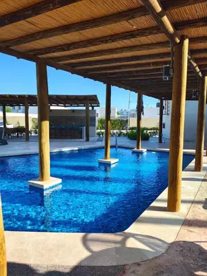 Piscina en o cerca de Nuevo departamento con acceso frente a la playa, jacuzzi y alberca climatizada