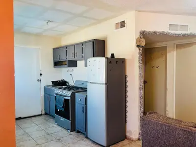 Una cocina o zona de cocina en Bienvenidos a la casa gris