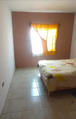 Cama o camas de una habitación en Bienvenidos a la casa gris
