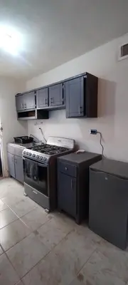 Una cocina o zona de cocina en Bienvenidos a la casa gris