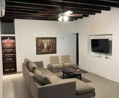 Una televisión o centro de entretenimiento en Quinta el Santuario