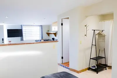 Una televisión o centro de entretenimiento en Depas Waicura s