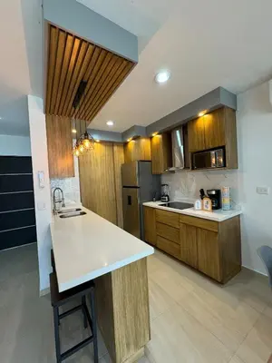 Una cocina o zona de cocina en Almarena Depto Boho Chic 800 mts from the Beach!