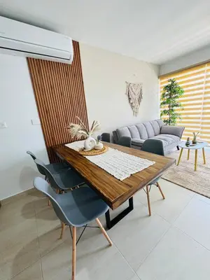 Zona de estar de Almarena Depto Boho Chic 800 mts from the Beach!